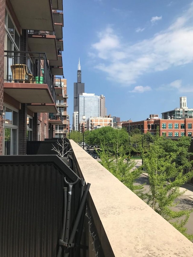 balcony featuring a city view