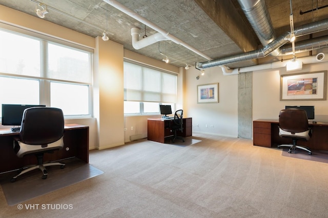 office space featuring carpet floors and baseboards