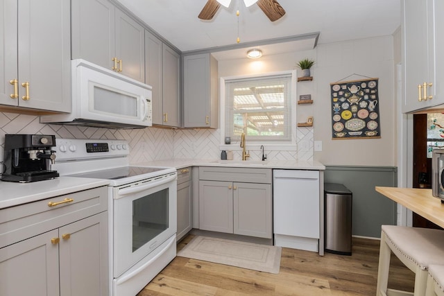 315 W Bennett St, Pontiac, IL 61764 - kitchen with white appliances, a sink, gray cabinetry, and a ceiling fan