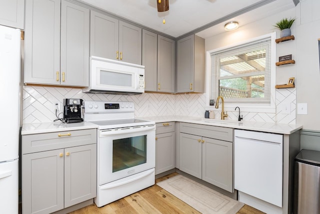 315 W Bennett St, Pontiac, IL 61764 - kitchen with white appliances, gray cabinets, and tasteful backsplash