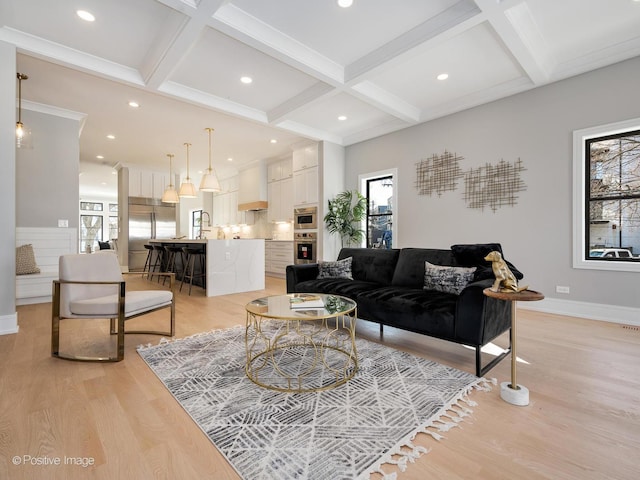 1727 W Barry Ave, Chicago, IL 60657 - living area with coffered ceiling, light wood finished floors, beam ceiling, baseboards, and recessed lighting