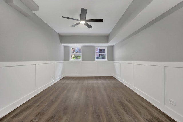 847 W Belle Plaine Ave Unit G, Chicago, IL 60613 - spare room featuring ceiling fan, dark wood finished floors, wainscoting, and a decorative wall