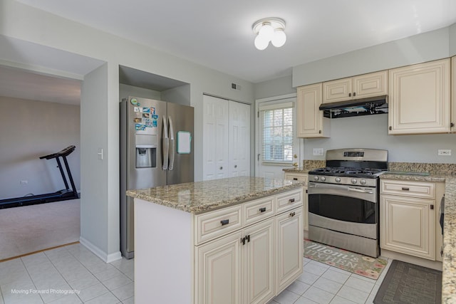 13 Caribou Ct, Bolingbrook, IL 60490 - kitchen featuring appliances with stainless steel finishes, under cabinet range hood, cream cabinets, and light tile patterned floors