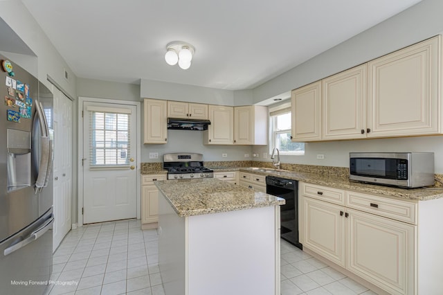 13 Caribou Ct, Bolingbrook, IL 60490 - kitchen with appliances with stainless steel finishes, cream cabinets, light tile patterned flooring, a kitchen island, and a sink