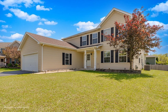13 Caribou Ct, Bolingbrook, IL 60490 - view of front facade featuring a garage, cooling unit, and driveway