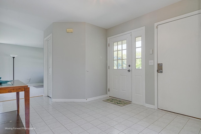 13 Caribou Ct, Bolingbrook, IL 60490 - entryway featuring light tile patterned floors and baseboards