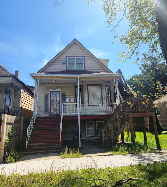 10435 S Calhoun Ave, Chicago, IL 60617 - view of front facade with stairs and covered porch