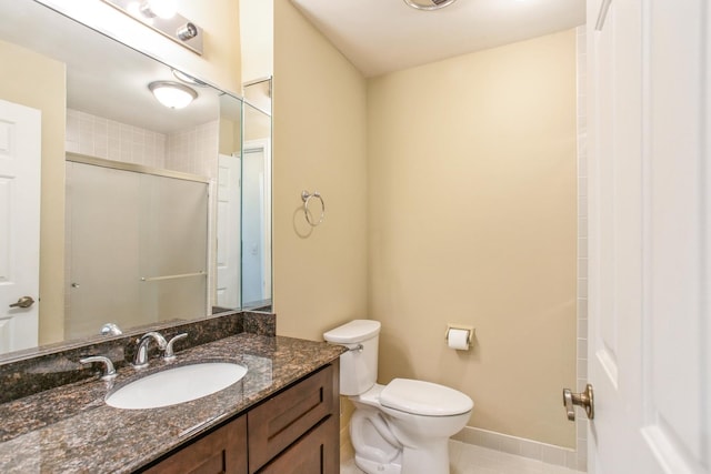 1401 Burr Oak Rd Unit 314B, Hinsdale, IL 60521 - full bathroom featuring toilet, an enclosed shower, vanity, and tile patterned floors