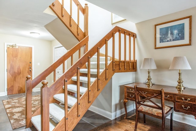 1401 Burr Oak Rd Unit 314B, Hinsdale, IL 60521 - stairway featuring baseboards and tile patterned flooring