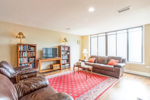 1401 Burr Oak Rd Unit 314B, Hinsdale, IL 60521 - living area with wood finished floors, baseboards, and recessed lighting