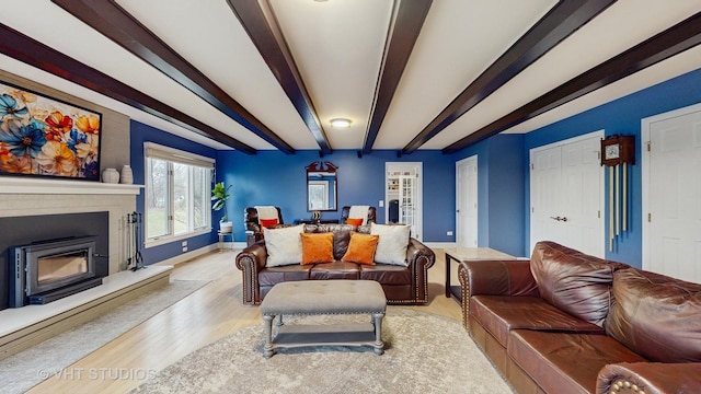 1375 Atkinson Rd, Green Oaks, IL 60048 - living area featuring beamed ceiling, baseboards, wood finished floors, and a glass covered fireplace