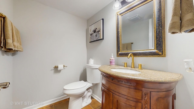 1375 Atkinson Rd, Green Oaks, IL 60048 - bathroom with toilet, baseboards, tile patterned floors, and vanity