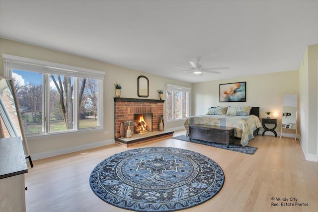 1375 Atkinson Rd, Green Oaks, IL 60048 - bedroom featuring wood finished floors, baseboards, and a fireplace