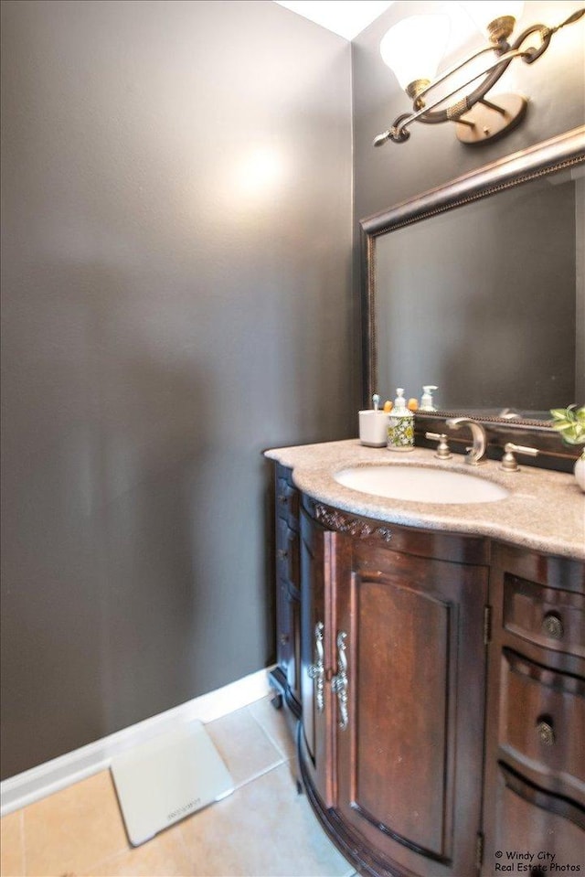 1375 Atkinson Rd, Green Oaks, IL 60048 - bathroom featuring tile patterned flooring, vanity, and baseboards