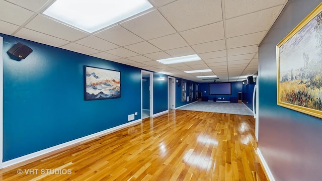 1375 Atkinson Rd, Green Oaks, IL 60048 - unfurnished room featuring hardwood / wood-style floors, a paneled ceiling, and baseboards