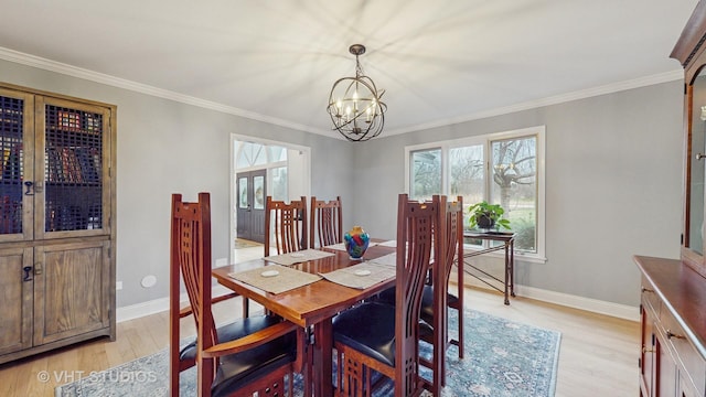 1375 Atkinson Rd, Green Oaks, IL 60048 - dining room featuring a chandelier, light wood-type flooring, crown molding, and baseboards