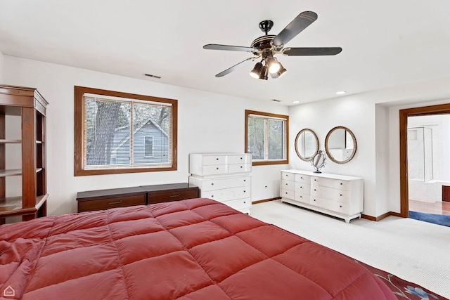 carpeted bedroom featuring baseboards, a ceiling fan, and recessed lighting