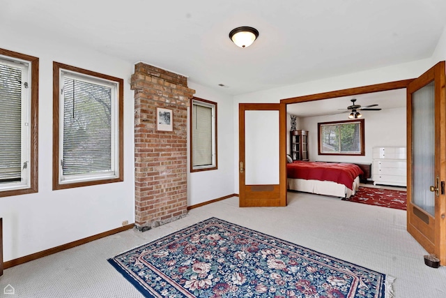 bedroom with carpet and baseboards