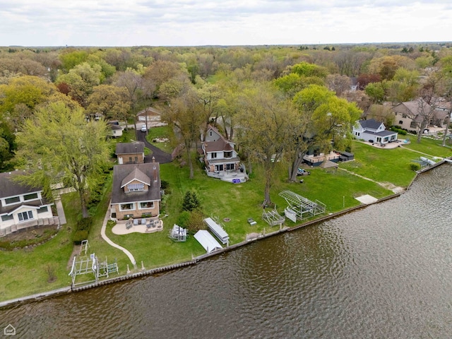 aerial overview of property's location featuring a nearby body of water and nearby suburban area