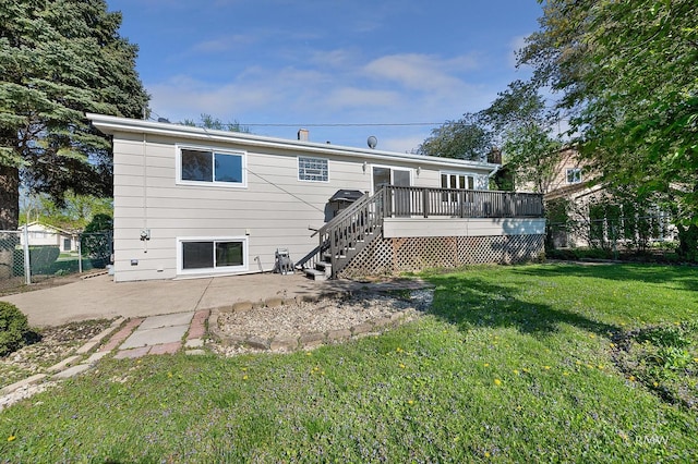 530 N Pioneer Dr, Addison, IL 60101 - rear view of house featuring a wooden deck, stairway, and a patio