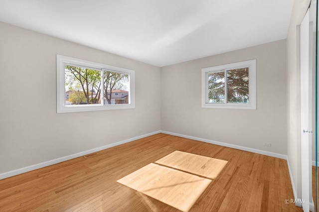 530 N Pioneer Dr, Addison, IL 60101 - spare room with baseboards and wood finished floors