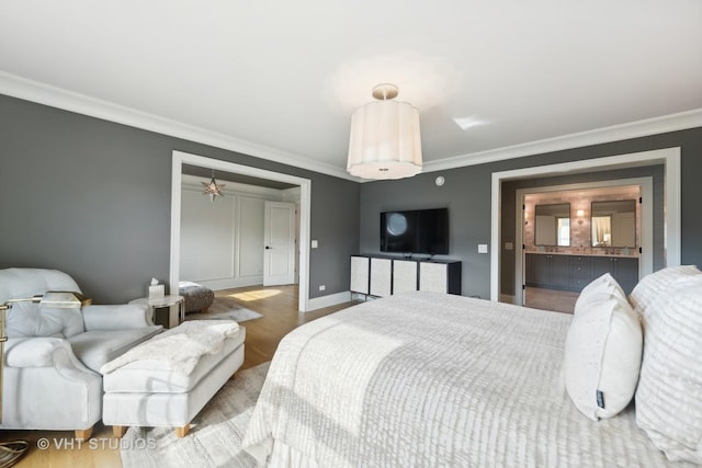 1110 Hickory Dr, Western Springs, IL 60558 - bedroom with ornamental molding, wood finished floors, baseboards, and connected bathroom