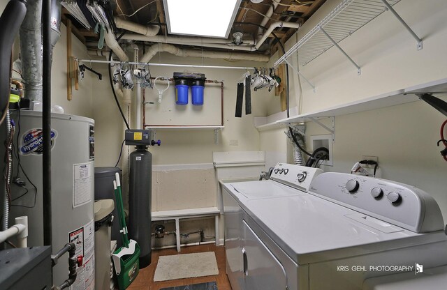 1204 Capri Ter, Mchenry, IL 60050 - clothes washing area with washing machine and dryer, water heater, and wood finished floors