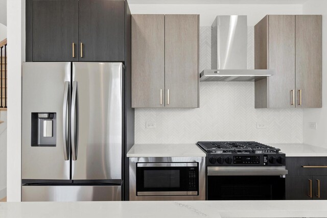 2700 W Jackson Blvd, Chicago, IL 60612 - kitchen featuring stainless steel appliances, wall chimney range hood, light countertops, and tasteful backsplash