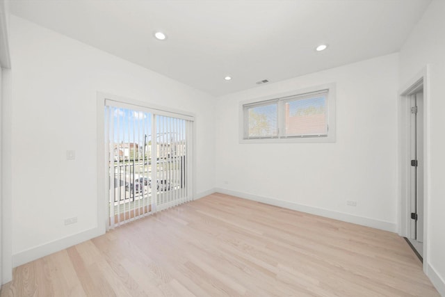 2700 W Jackson Blvd, Chicago, IL 60612 - spare room with light wood-style floors, baseboards, and recessed lighting