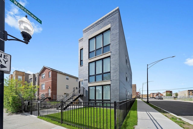 2700 W Jackson Blvd, Chicago, IL 60612 - view of property featuring a fenced front yard and a residential view