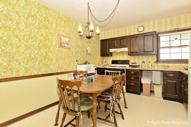 5308 Wonder Woods Dr, Wonder Lake, IL 60097 - dining space with a chandelier, wallpapered walls, and baseboards