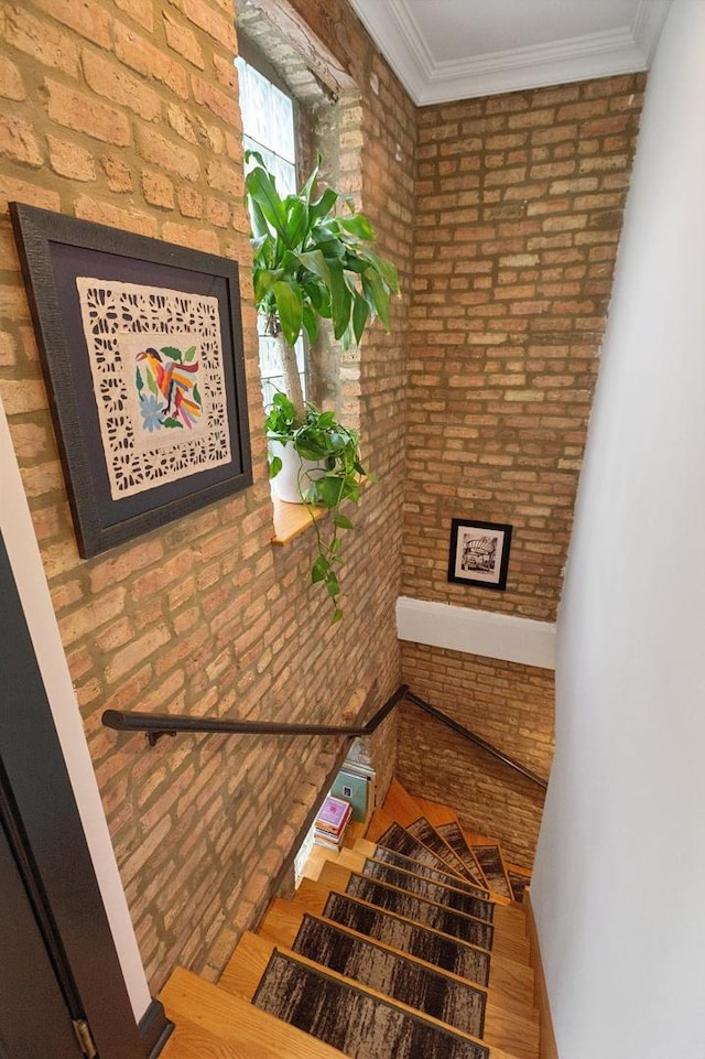 2250 W Argyle St Unit 1, Chicago, IL 60625 - stairway featuring brick wall and wood finished floors