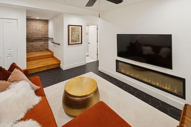 2250 W Argyle St Unit 1, Chicago, IL 60625 - living area with a ceiling fan and baseboards