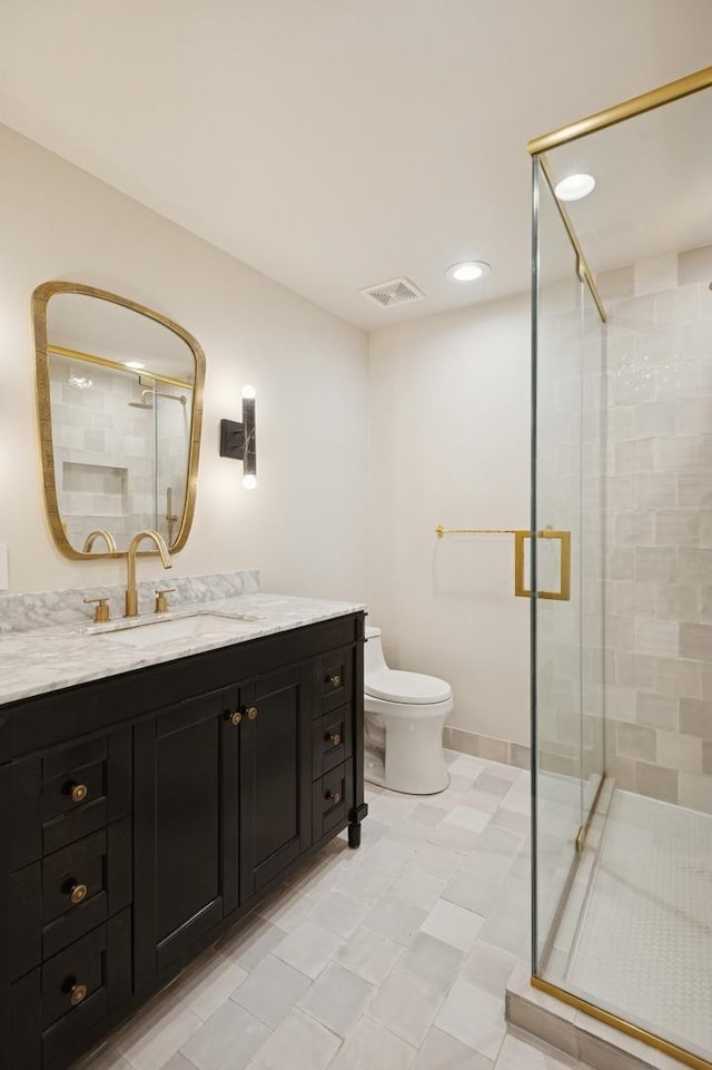 2250 W Argyle St Unit 1, Chicago, IL 60625 - full bath featuring toilet, a stall shower, vanity, and recessed lighting