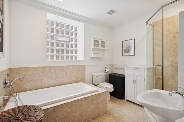 2250 W Argyle St Unit 1, Chicago, IL 60625 - full bath with a stall shower, ornamental molding, tile patterned floors, toilet, and a garden tub