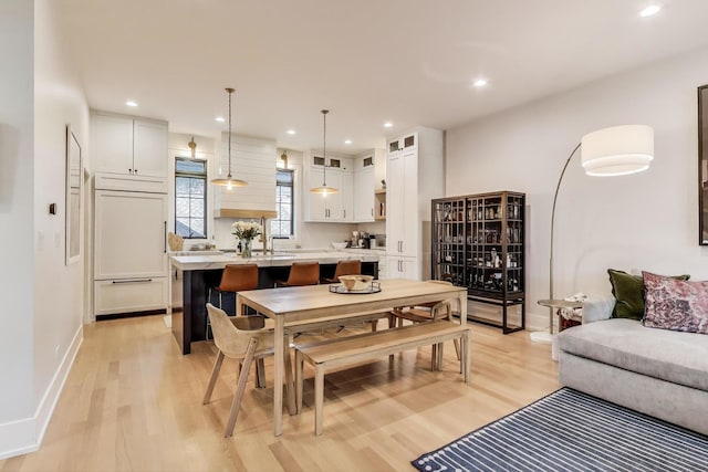 2312 W Hutchinson St, Chicago, IL 60618 - dining area featuring light wood finished floors, recessed lighting, and baseboards