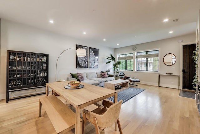 2312 W Hutchinson St, Chicago, IL 60618 - dining space with light wood-style floors, recessed lighting, and baseboards