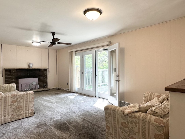 77 Briarcliff Ln, Bourbonnais, IL 60914 - living room featuring carpet floors, ceiling fan, and a fireplace