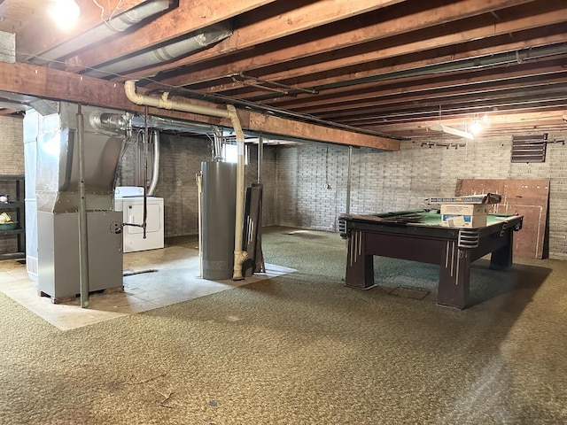 77 Briarcliff Ln, Bourbonnais, IL 60914 - unfinished below grade area featuring water heater, heating unit, washing machine and dryer, and pool table