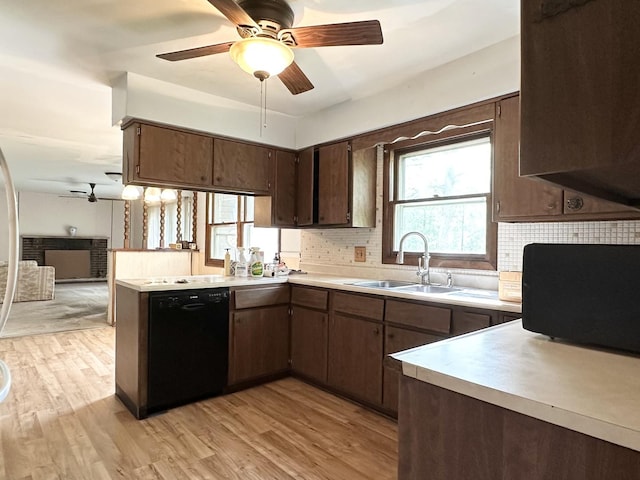 77 Briarcliff Ln, Bourbonnais, IL 60914 - kitchen with dishwasher, a ceiling fan, light countertops, and a peninsula