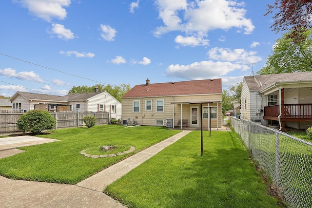 back of property with central AC unit