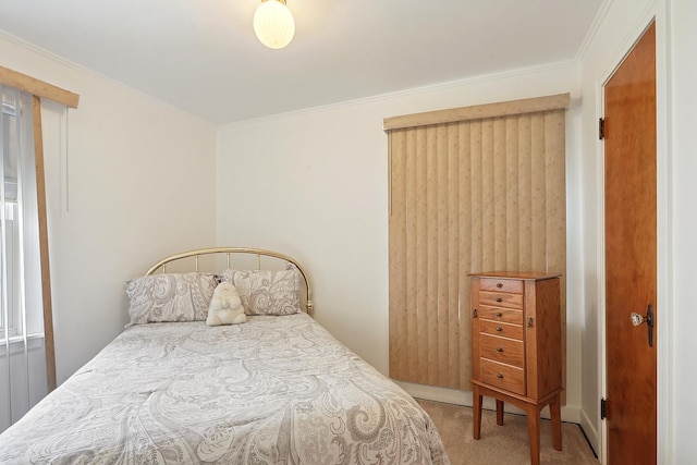 bedroom with carpet and crown molding