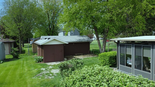 406 E Fine St, Ashkum, IL 60911 - view of yard with a sunroom