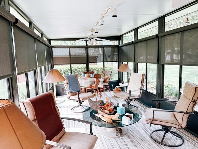 406 E Fine St, Ashkum, IL 60911 - sunroom featuring rail lighting and ceiling fan