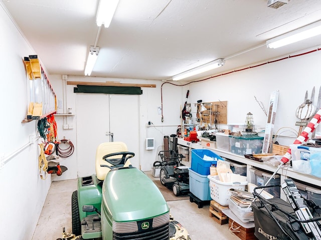 406 E Fine St, Ashkum, IL 60911 - below grade area featuring a workshop area