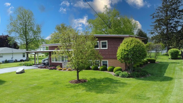 406 E Fine St, Ashkum, IL 60911 - view of front of property featuring a front lawn and brick siding