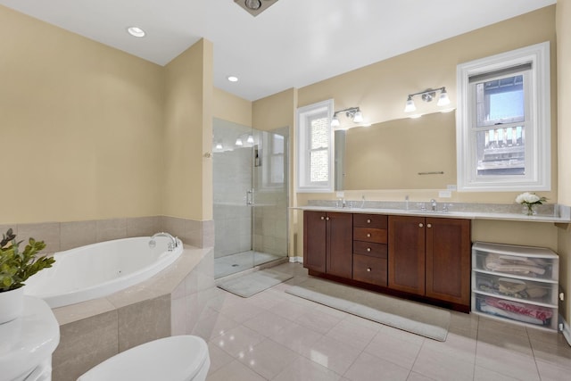 5127 N Damen Ave Unit B, Chicago, IL 60625 - full bath featuring double vanity, a bath, healthy amount of natural light, a shower stall, and recessed lighting