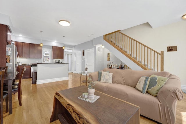 5127 N Damen Ave Unit B, Chicago, IL 60625 - living area with light wood-type flooring and stairs
