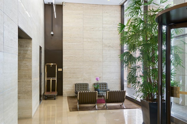 lobby featuring a high ceiling