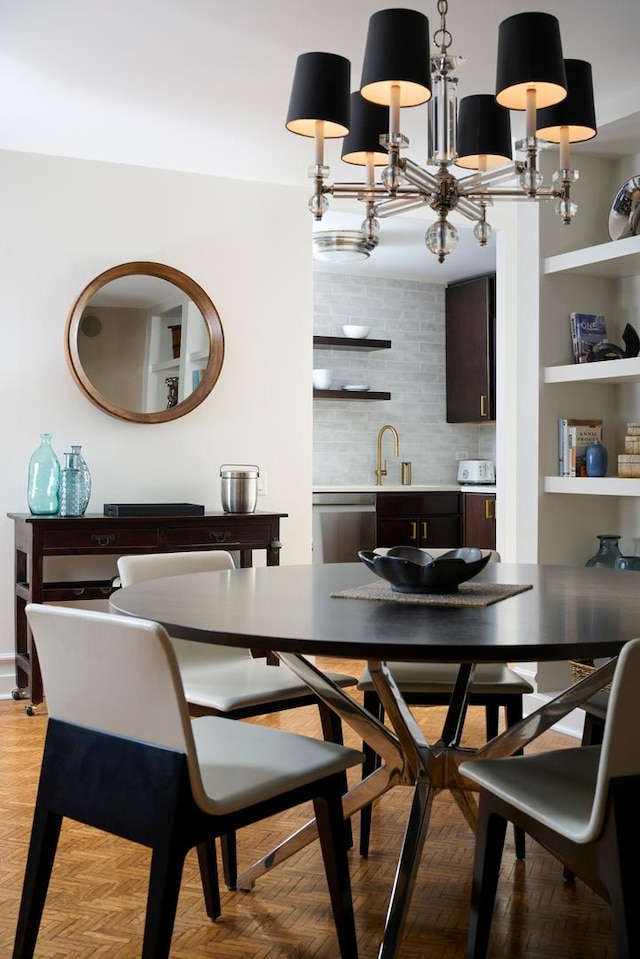 dining space with a chandelier